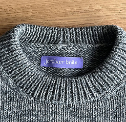 Jordbaer Knits woven label